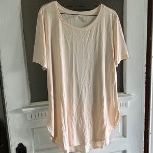BNWOT woman’s ZYIA light peach shirt with high low rounded hem size XL